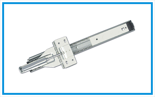 Over top flipper door slide with soft-down cylinder